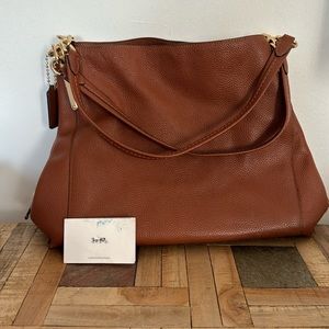 Beautiful Coach slouchy Dalton 31 bag!!! Color brown!!! Polished pebble leather!